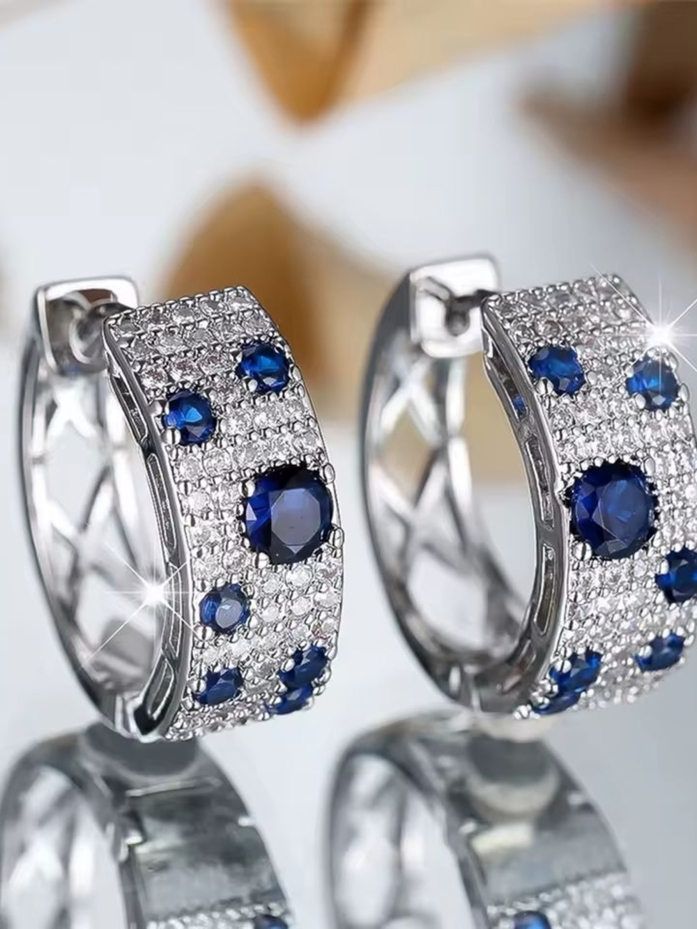 Sterling-Inspired Silver Hoop Earrings with Deep Blue Crystals - Picture 2 of 3